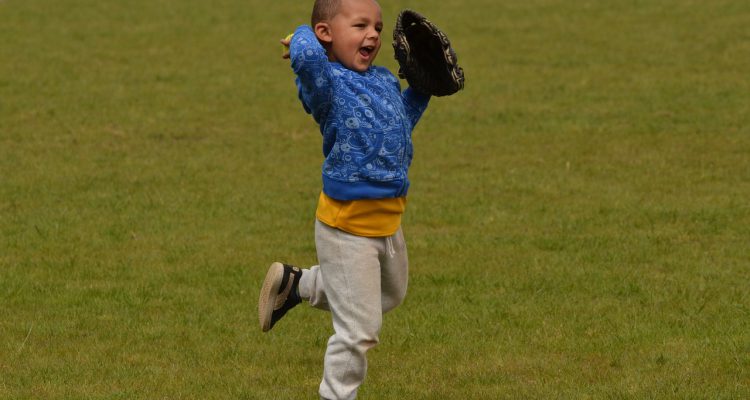 Teaching kids to catch a baseball